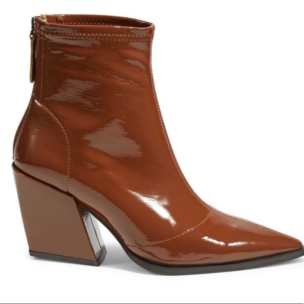 Short ankle-length boots made of paten leather